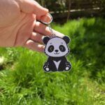 - Breloc: Pui de panda