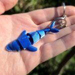- Breloc: Delfin